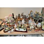 A QUANTITY OF FIGURINES AND DECORATIVE ORNAMENTS, approximately forty five pieces to include