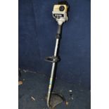 A RYOBI PETROL STRIMMER (untested but engine pulling freely)