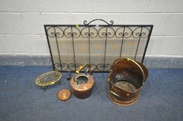 A CAST IRON FIRE SCREEN, a copper coal scuttle, a copper kettle with no lid, a brass trivet stand,