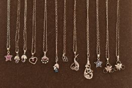 A SELECTION OF WHITE METAL GEM SET NECKLACES, twelve white mental pendants suspended from white
