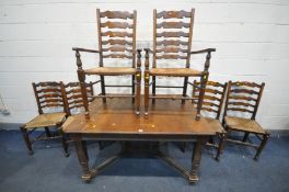 AN EARLY 20TH CENTURY FRENCH OAK EXTENDING DINING TABLE, on square tapered legs, united by bobbin