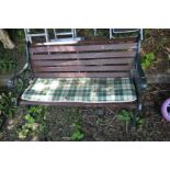 A METAL FRAMED WOODEN SLATTED GARDEN BENCH, length 128cm x depth 64cm