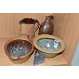 FOUR PIECES OF JOHN LEACH MUCHELNEY STONEWARE POTTERY, comprising a deep circular bowl with wide rim