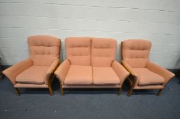 A PARKER KNOLL ASH FRAMED THREE PIECE SUITE, comprising a two seater sofa, length 126cm and two