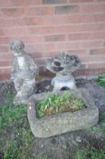 A SMALL COMPOSITE PAGODA, height 46cm, composite rectangular planter and garden ornament of a boy