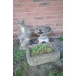 A SMALL COMPOSITE PAGODA, height 46cm, composite rectangular planter and garden ornament of a boy