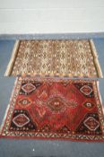 A RED GROUNG PERSIAN SHIRAZ RUG, length 136cm x depth 92cm, and another rug (good condition) (2)