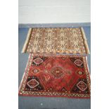 A RED GROUNG PERSIAN SHIRAZ RUG, length 136cm x depth 92cm, and another rug (good condition) (2)