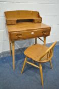 AN ERCOL MID CENTURY ELM AND BEECH MODEL 439 WRITING DESK, with two small drawers to top and a