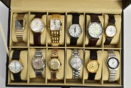 A WATCH DISPLAY CASE WITH WATCHES, black faux leather case with twelve watch storage spaces and