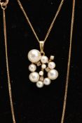 A 9CT GOLD PEARL AND DIAMOND NECKLACE, a cluster of varying sized white pearls, approximate