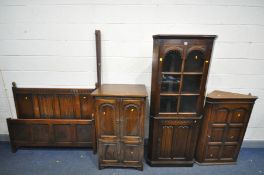 AN OAK LINENFOLD CORNER CUPBOARD, width 72cm x depth 39cm x height 176cm (key) a reproduction oak