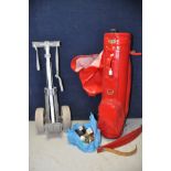 A RED LEATHER LOOK GOLF BAG along with a Powa Caddy pullman and a bag of golf balls (3)