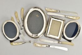 A BOX OF ASSORTED SILVERWARE, to include a set of four silver knives and forks, fitted with mother