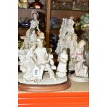 SEVEN RESIN FIGURES AND FIGURE GROUPS, most marked A Balconi, including a bride and groom,