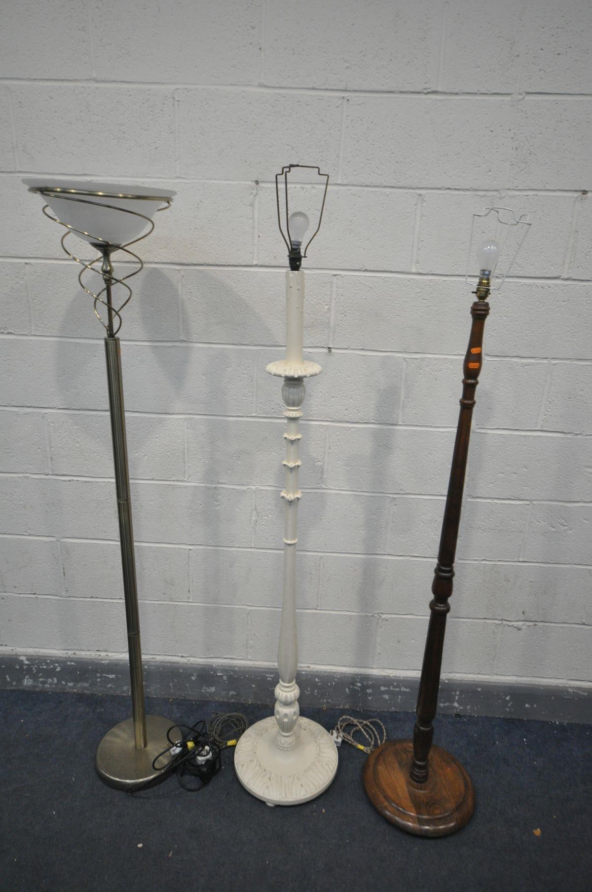 THREE VARIOUS STANDARD LAMPS, to include a Nikel uplighter lamp