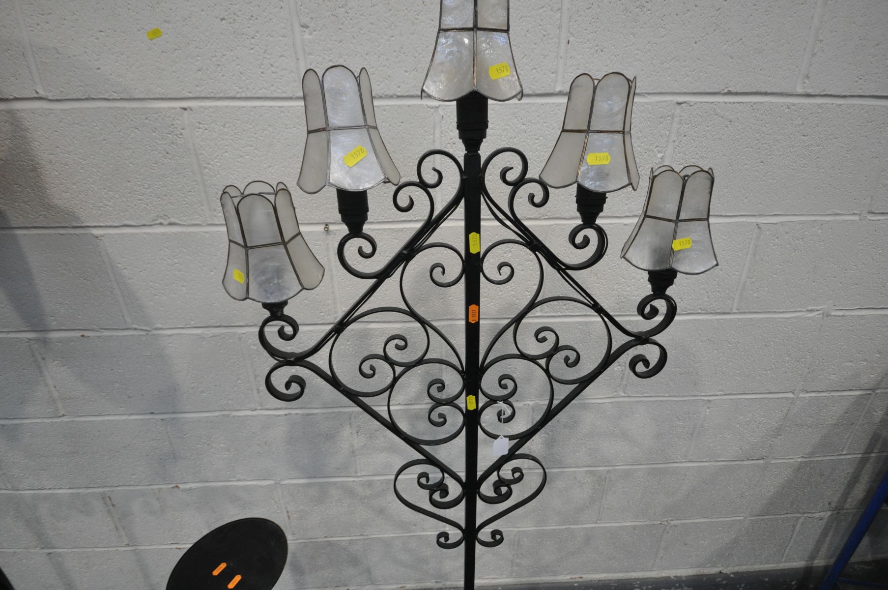 A WROUGHT IRON FIVE BRANCH STANDARD LAMP, all with small shades, with four legs, another wrought - Bild 2 aus 3