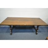 A 20TH CENTURY SPANISH WALNUT REFECTORY TABLE, on a pair of shaped trestle legs, united by a pair of