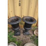 A PAIR OF EBONISED CAST IRON CAMPAGNA GARDEN URNS, diameter 48cm x height 69cm