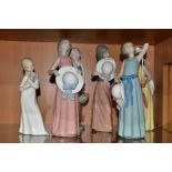 FOUR LLADRO FIGURES OF GIRLS WITH HATS AND TWO OTHER SPANISH PORCELAIN FIGURES, comprising Naughty
