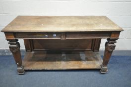 AN EARLY 20TH CENTURY OAK SIDE TABLE, with two drawers, square tapered Corinthian columns, united by