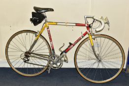A VINTAGE ROSSIN RACING BICYCLE CIRCA 1980s, fitted with a Campagnolo front crank set and chain