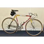 A VINTAGE ROSSIN RACING BICYCLE CIRCA 1980s, fitted with a Campagnolo front crank set and chain