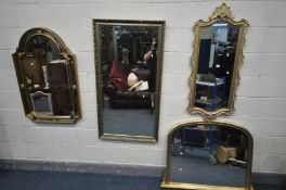 FOUR LATE 20TH CENTURY GILT FRAMED WALL MIRRORS, of various styles and sizes, largest mirror size