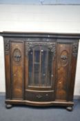 A FRENCH OAK TRIPLE DOOR WARDROBE, with a central mirrored door, and drawer, width 200cm x depth