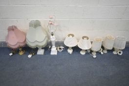 EIGHT VARIOUS TABLE LAMPS, comprising a marble lamp with green shade, another marble lamp, a brass