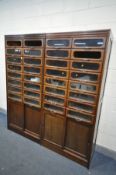 A PAIR OF EARLY 20TH CENTURY MAHOGANY HABERDASHERY CABINETS, made up of sixteen glass fronted