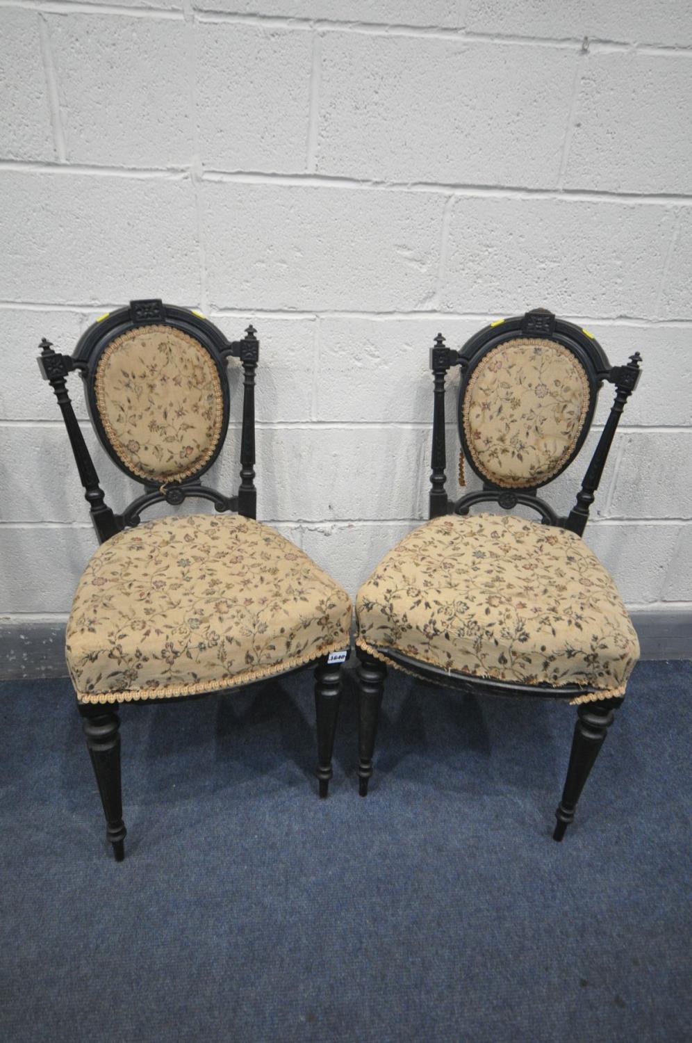 A PAIR OF LATE 19TH CENTURY AESTHETIC MOVEMENT EBONISED CHAIRS, stamped to underside 'John Taylor