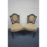 A PAIR OF LATE 19TH CENTURY AESTHETIC MOVEMENT EBONISED CHAIRS, stamped to underside 'John Taylor