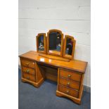 A CHERRYWOOD DRESSING TABLE with six drawers, length 147cm x depth 44cm x height 74cm, and a