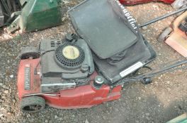 A MOUNTFIELD PETROL ROLLER LAWNMOWER (distressed condition, grass box not fitting properly, but