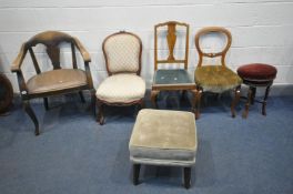 AN EARLY TO MID 20TH CENTURY OAK ARMCHAIR, along with three other chairs, a Late Victorian walnut