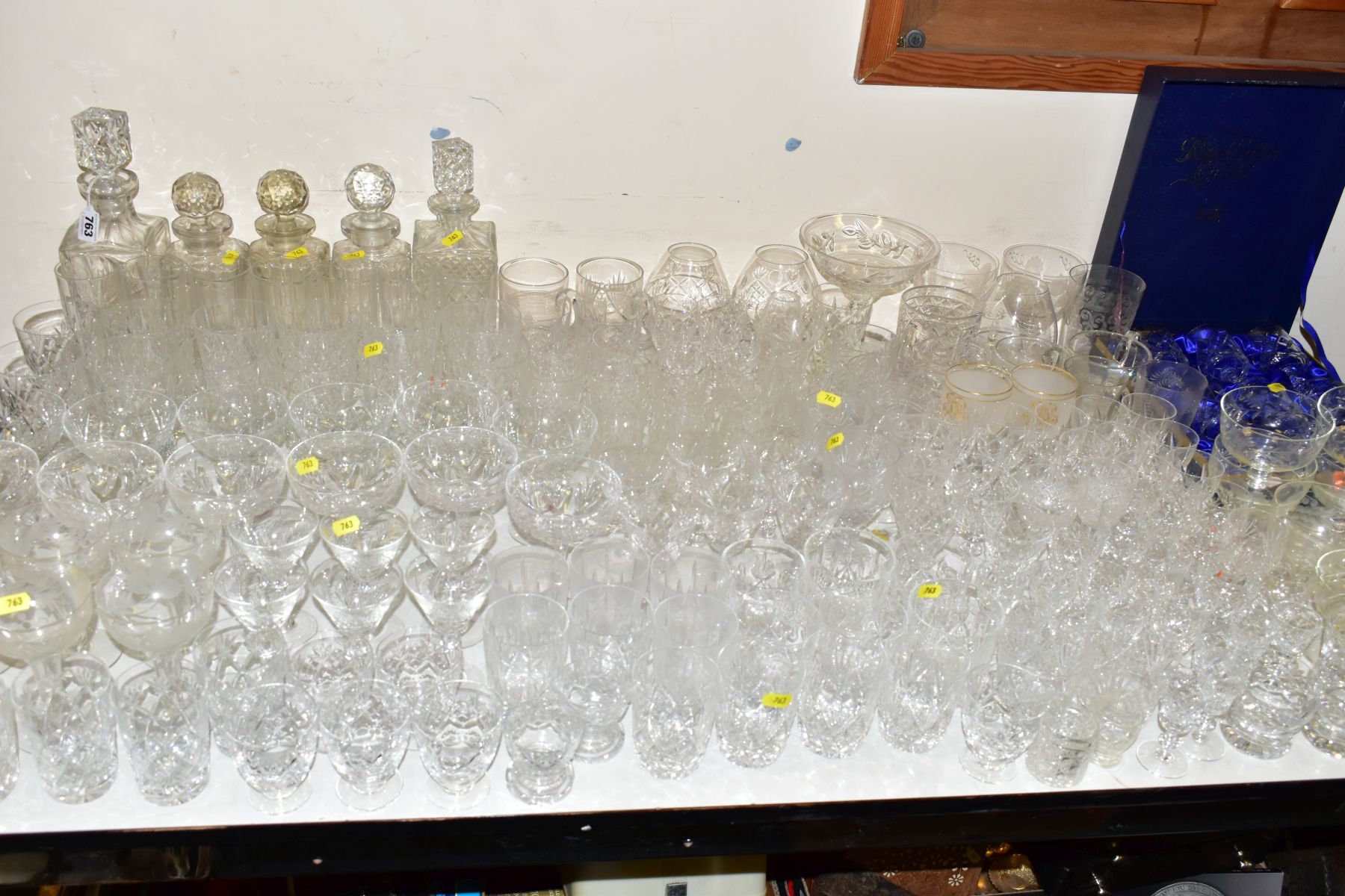 A LARGE COLLECTION OF DRINKING GLASSES, FIVE DECANTERS, A BOXED SET OF ROYAL SEFTON CRYSTAL WINE