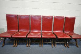 A SET OF SIX 1970'S SPANISH WOOD AND READ LEATHER HIGH BACK CHAIRS, with X-framed legs, united by