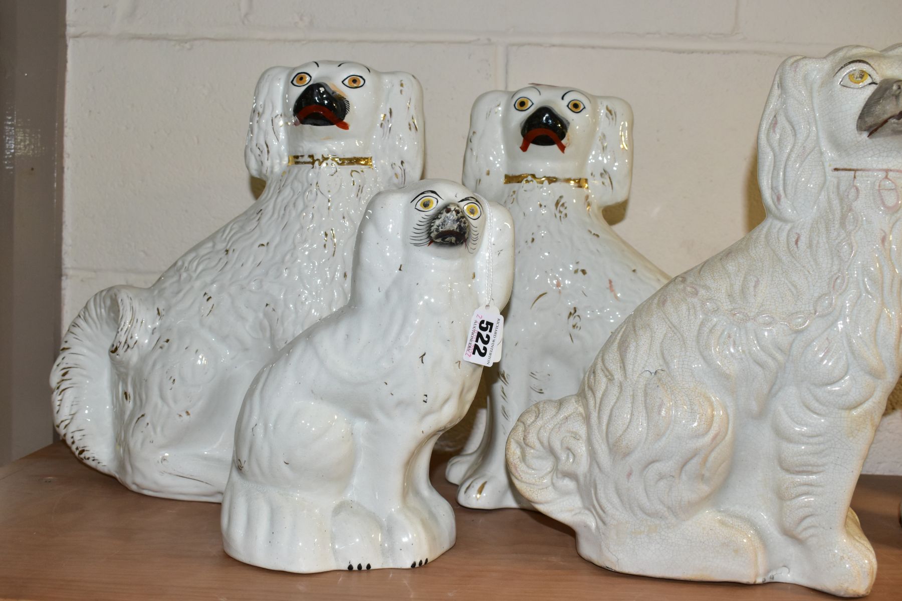 SIX STAFFORDSHIRE SPANIELS, white glazed with gilt details, comprising two pairs approximate heights - Bild 2 aus 5