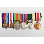A GROUP OF FIVE MEDALS ON A WEARING BAR AS FOLLOWS, 1939-45, France & Germany Stars, Defence & War