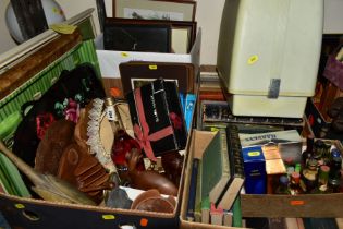 FOUR BOXES CONTAINING A QUANTITY OF BOOKS, FRAMED PRINTS AND A CASED SINGER SEWING MACHINE, two