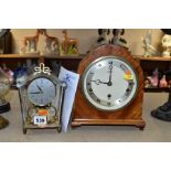 A MID 20TH CENTURY WALNUT ARCH CASED ELLIOT MANTEL CLOCK, silvered chapter ring with Roman numerals,