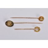 THREE STICKPINS, to include a late Victorian 9ct gold split pearl horseshoe stickpin, hallmarked 9ct