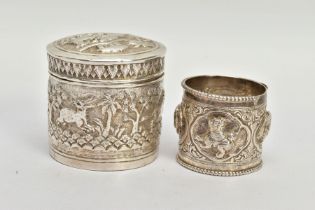 TWO EARLY 20TH CENTURY ITEMS, the first an embossed unmarked white metal pot depicting a hunting