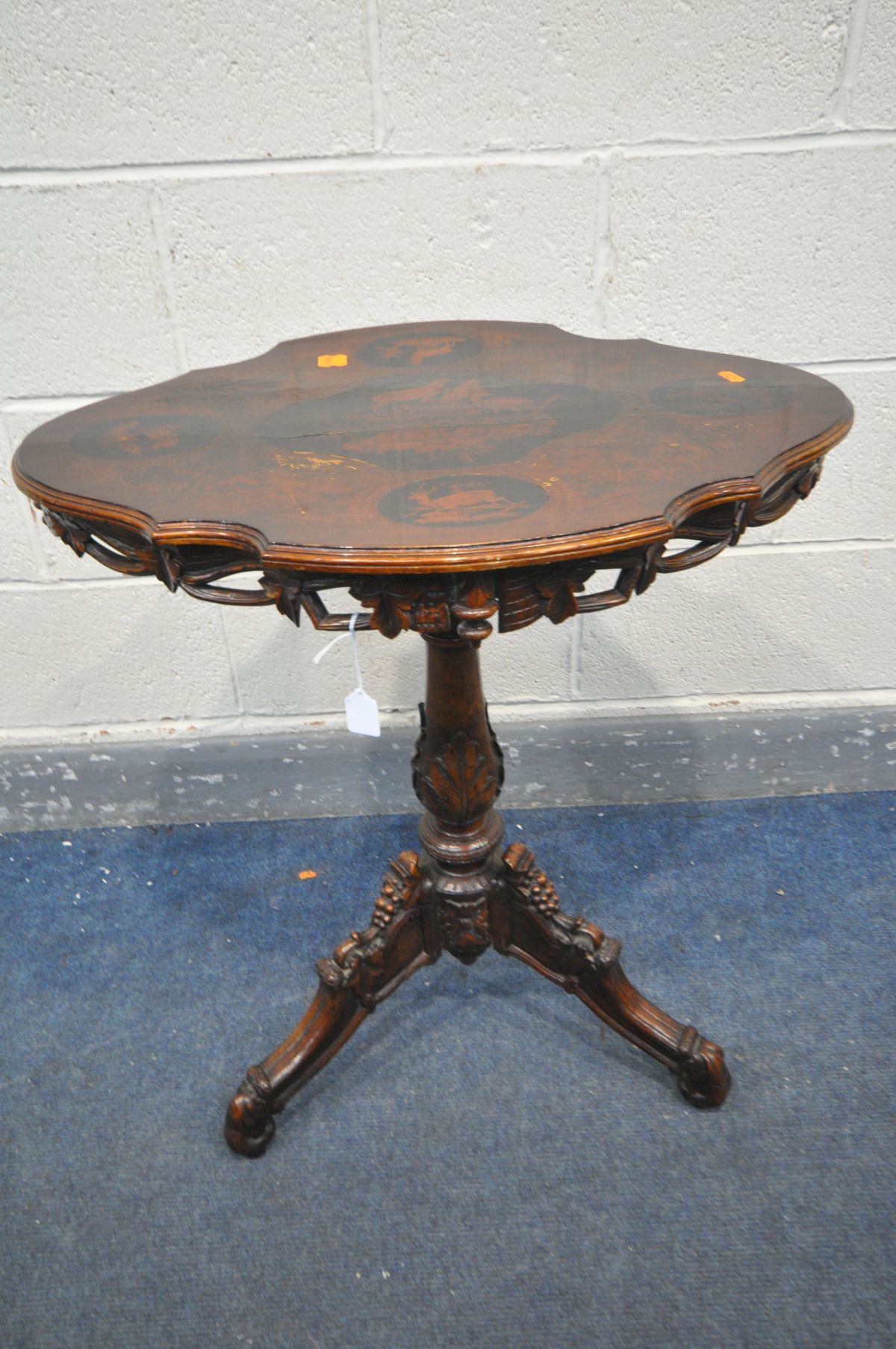 A 19TH CENTURY MAHOGANY AND MARQUETRY INLAID BLACK FORREST STYLE TILT TOP MUSICAL TRIPOD TABLE,