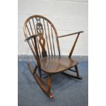 AN ERCOL PRINCE OF WALES BACK ROCKING CHAIR with open armrests (condition:-missing original seat