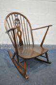 AN ERCOL PRINCE OF WALES BACK ROCKING CHAIR with open armrests (condition:-missing original seat