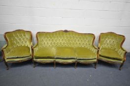 A MID TO LATE 20TH CENTURY FRENCH STYLE THREE PIECE SUITE, covered in green buttoned upholstery,