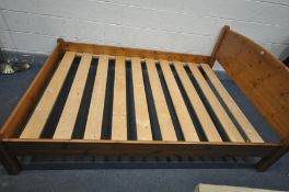 A PINE 4FT6 BEDSTEAD