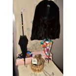 AN EMBROIDERED WALL HANGING, A FUR JACKET, A TEDDY BEAR AND PARASOLS, the wall hanging embroidered